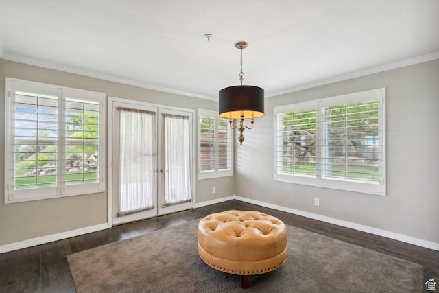 2863 S Cove Ln, Bountiful, UT 84010 - living area featuring healthy amount of natural light, crown molding, wood finished floors, and baseboards