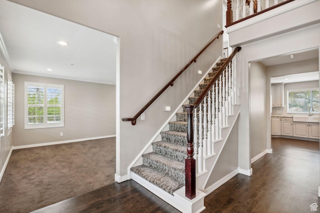2863 S Cove Ln, Bountiful, UT 84010 - stairway with baseboards, wood finished floors, recessed lighting, ornamental molding, and carpet floors