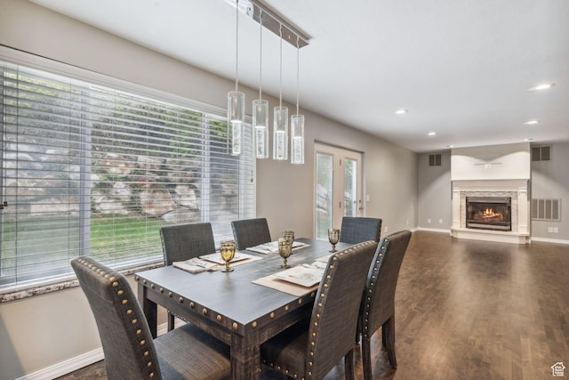 2863 S Cove Ln, Bountiful, UT 84010 - dining space with wood finished floors, baseboards, recessed lighting, and a glass covered fireplace