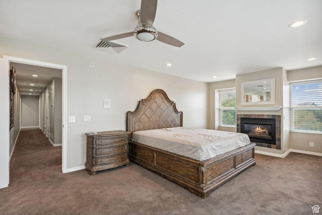 2863 S Cove Ln, Bountiful, UT 84010 - carpeted bedroom with a tiled fireplace, baseboards, ceiling fan, and recessed lighting