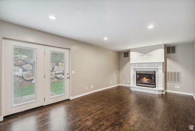 2863 S Cove Ln, Bountiful, UT 84010 - unfurnished living room featuring a stone fireplace, wood finished floors, baseboards, and recessed lighting
