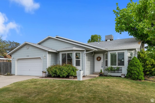 ranch-style home featuring a garage, driveway, and a shingled roof