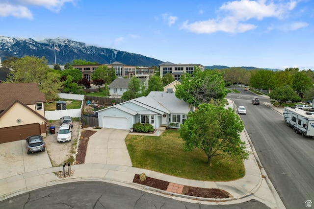 aerial view of residential area with a mountain backdrop