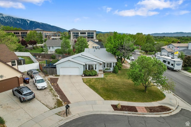 aerial perspective of suburban area featuring a mountain backdrop