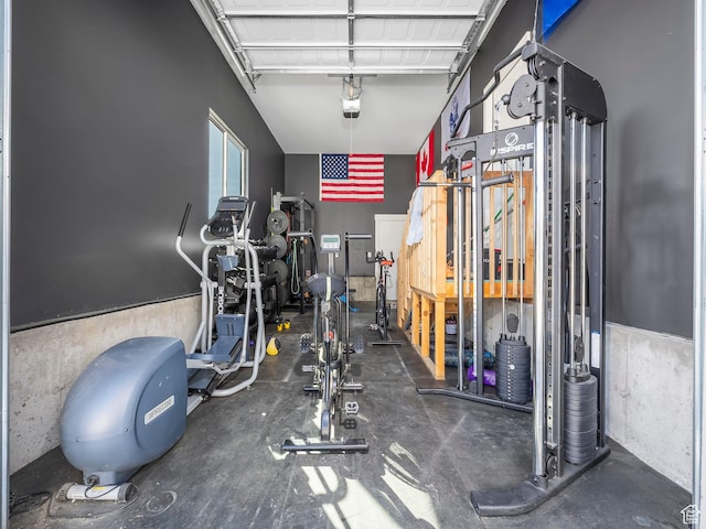 workout area with a garage