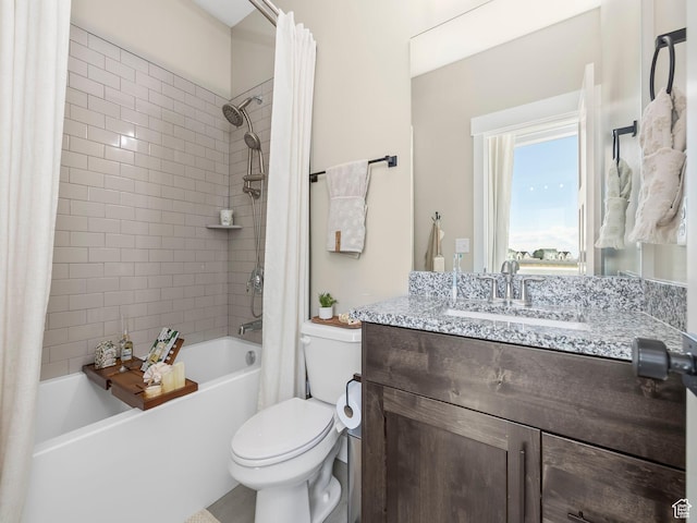 full bath featuring toilet, shower / bathtub combination with curtain, and vanity