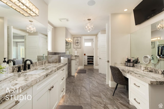 full bath featuring a chandelier, baseboards, a closet, and recessed lighting