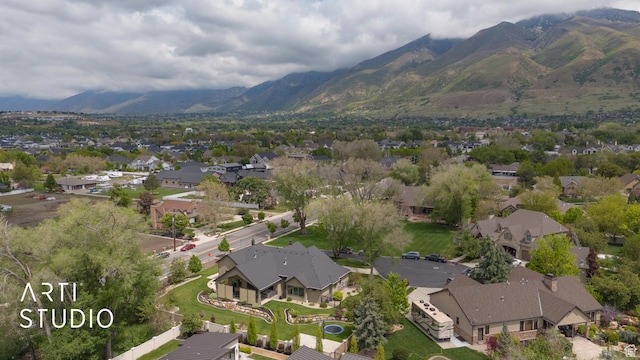 aerial perspective of suburban area featuring a mountain backdrop