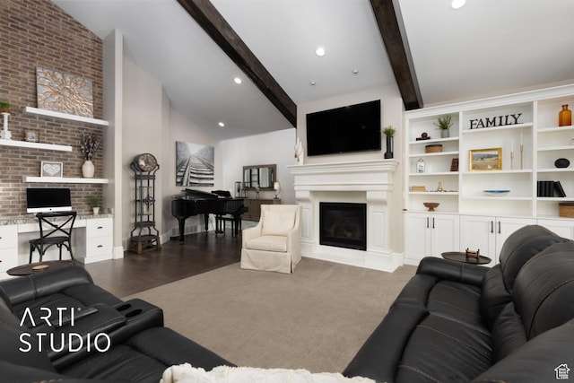 living room with a glass covered fireplace, baseboards, and recessed lighting