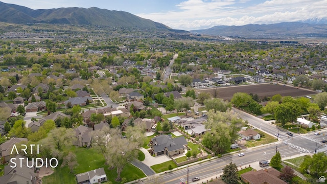 aerial view of residential area with mountains