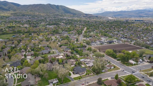 aerial overview of property's location featuring a mountain backdrop