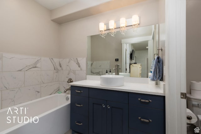 full bathroom featuring a garden tub and vanity