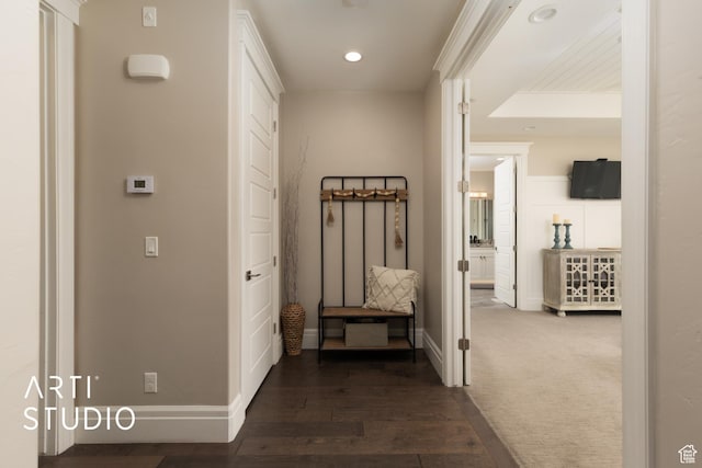 hall with baseboards, recessed lighting, and dark wood-style floors