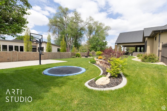 view of yard featuring a trampoline