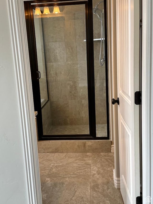 bathroom with a shower stall