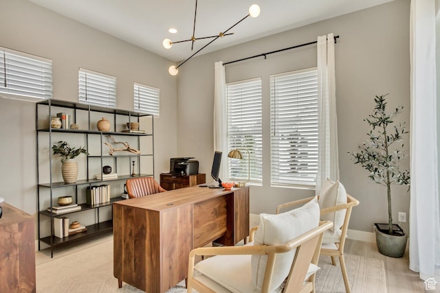 office featuring a chandelier, recessed lighting, and light wood-style flooring