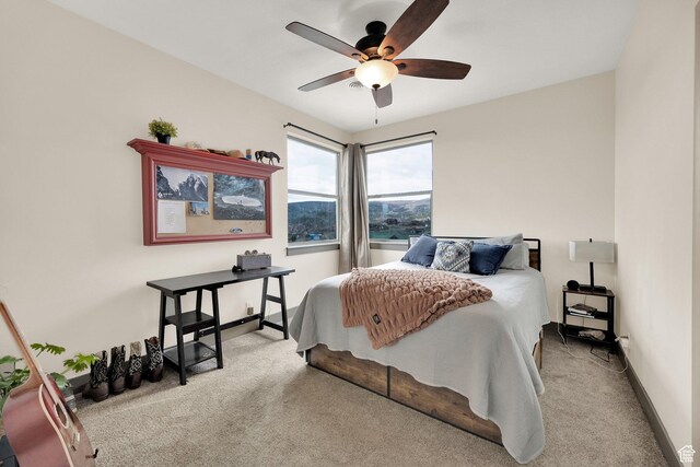 9048 E Acorn Way Unit 984, Heber City, UT 84032 - bedroom with carpet, a ceiling fan, and baseboards