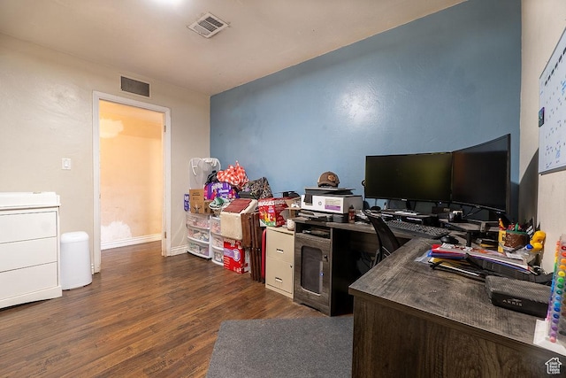 office area with dark wood finished floors and baseboards