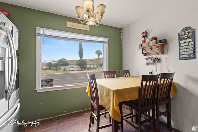 382 W 200 N, St George, UT 84770 - dining room featuring a chandelier, wood finished floors, and baseboards