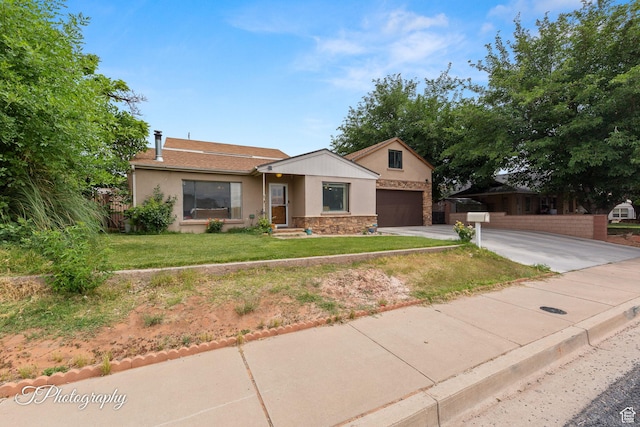 382 W 200 N, St George, UT 84770 - ranch-style home with concrete driveway, stone siding, stucco siding, and an attached garage