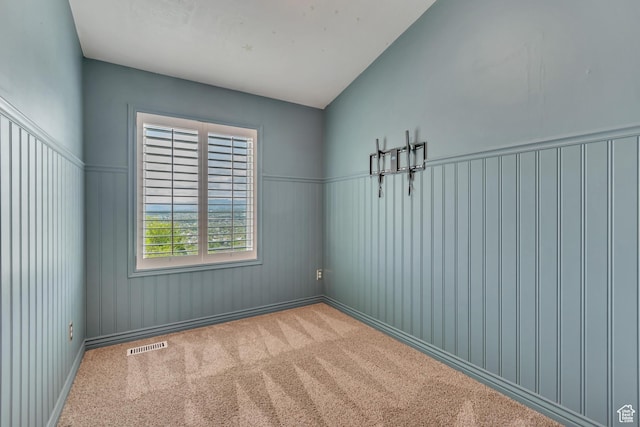 spare room featuring carpet flooring