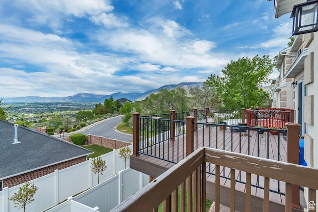 balcony featuring a mountain view