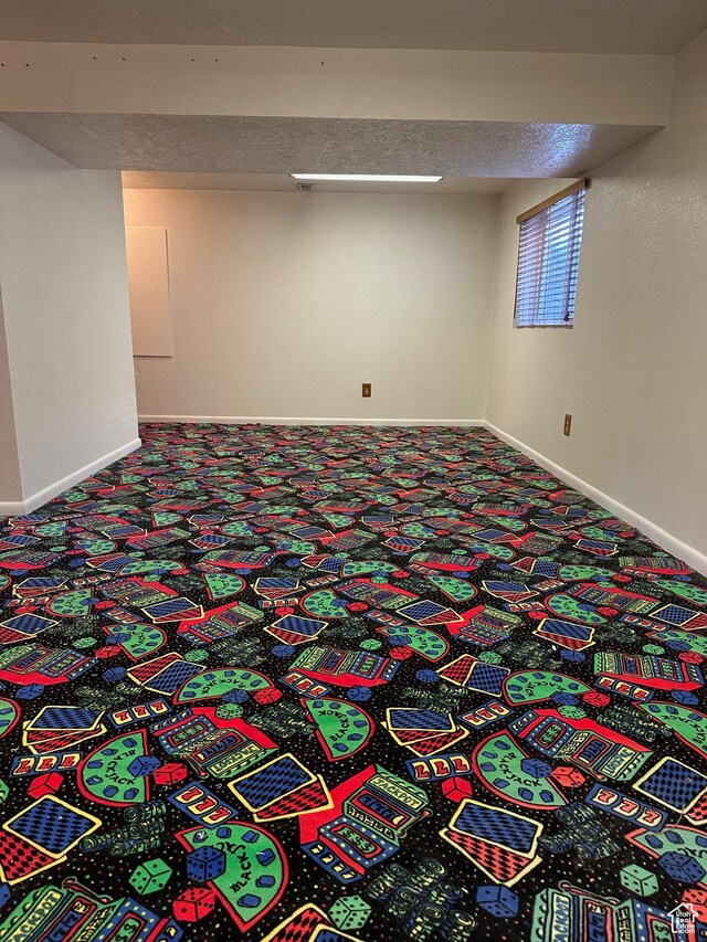 finished basement with carpet and baseboards