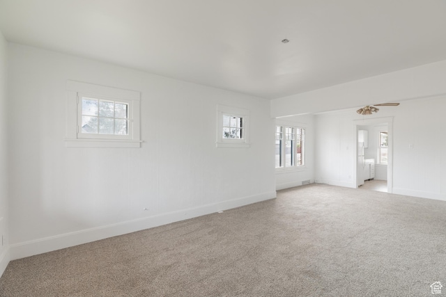 98 S Center St, Redmond, UT 84652 - unfurnished room featuring healthy amount of natural light, light carpet, and baseboards