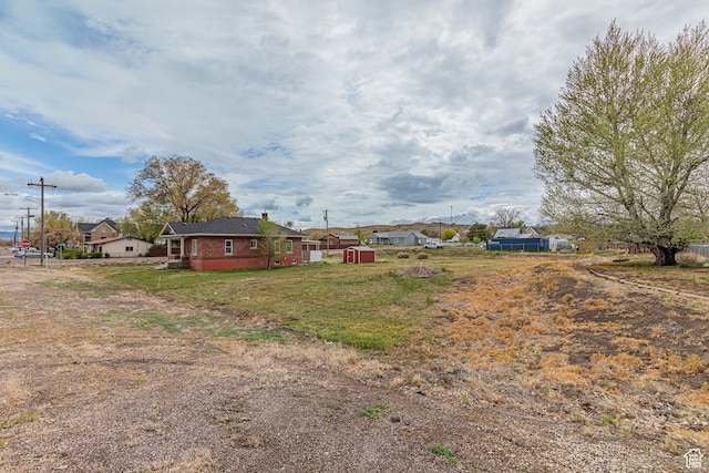 98 S Center St, Redmond, UT 84652 - view of yard featuring a storage shed and an outbuilding