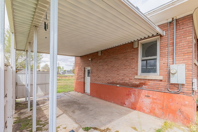 98 S Center St, Redmond, UT 84652 - view of patio / terrace with fence and an attached carport