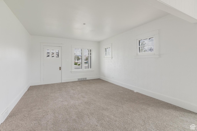 98 S Center St, Redmond, UT 84652 - carpeted empty room with healthy amount of natural light and baseboards