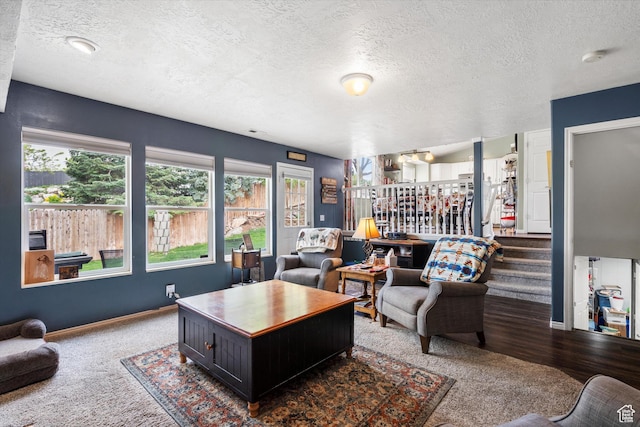 3347 N 1150 E, Layton, UT 84040 - living room with a textured ceiling, healthy amount of natural light, carpet, and baseboards