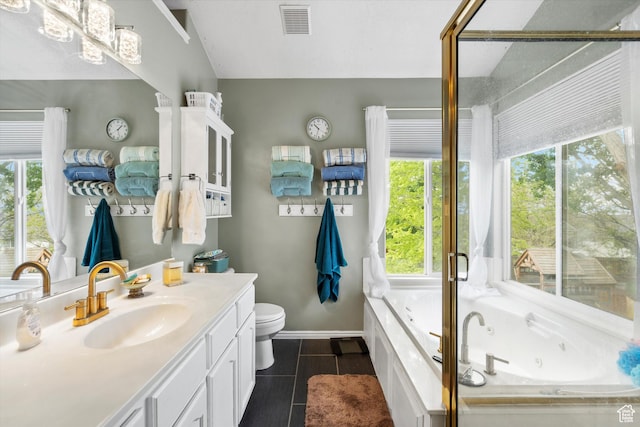 3347 N 1150 E, Layton, UT 84040 - full bath with vanity, a whirlpool tub, toilet, tile patterned flooring, and baseboards