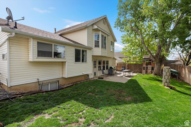 3347 N 1150 E, Layton, UT 84040 - rear view of property featuring a patio and a shingled roof