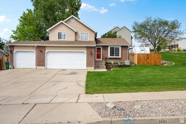 3347 N 1150 E, Layton, UT 84040 - view of front of house featuring concrete driveway, brick siding, a shingled roof, and an attached garage
