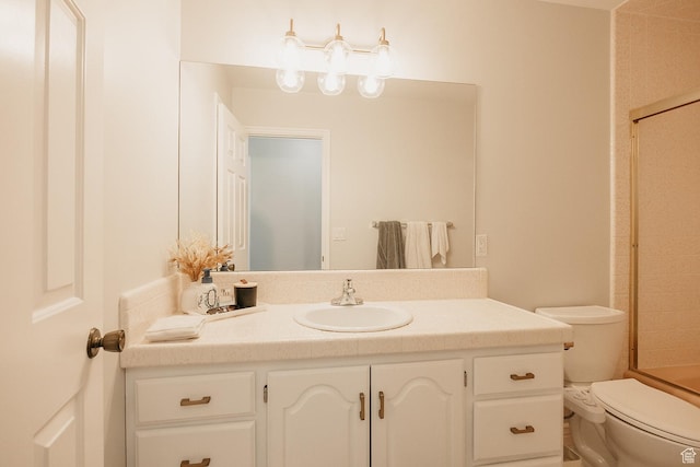 bathroom with toilet, a shower, and vanity