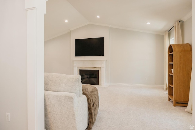 living area featuring light carpet, recessed lighting, a fireplace, ornamental molding, and baseboards