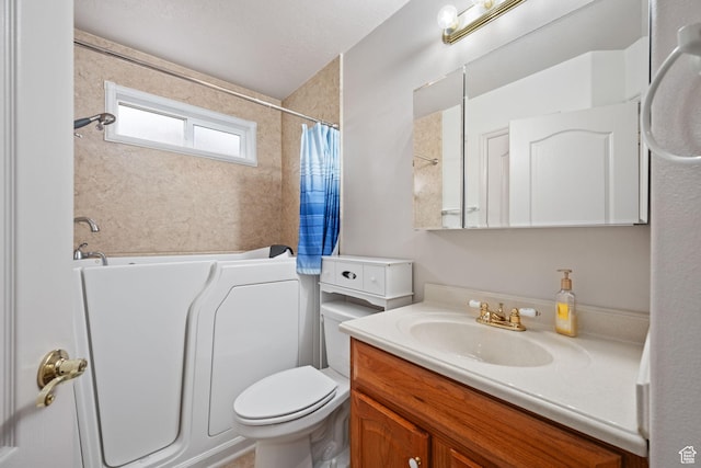 bathroom with a bathtub, toilet, curtained shower, and vanity