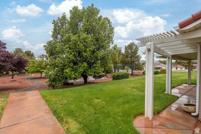view of yard with a pergola