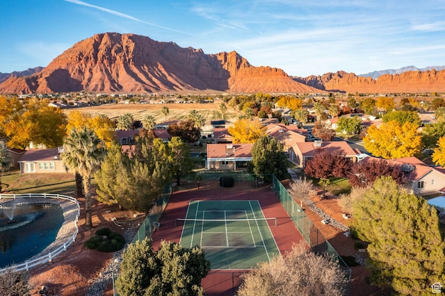 aerial perspective of suburban area with a mountain backdrop