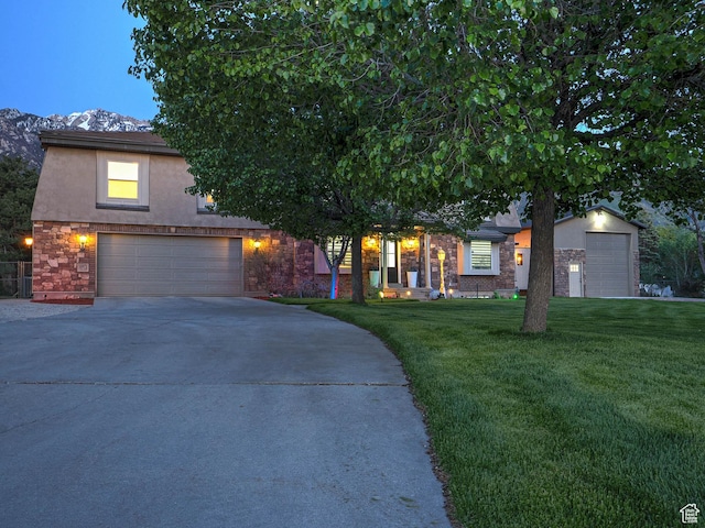 obstructed view of property with a front yard, driveway, stucco siding, a garage, and stone siding