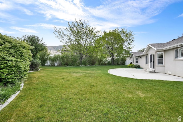 3267 S 1350 W, Perry, UT 84302 - view of green lawn featuring a patio area