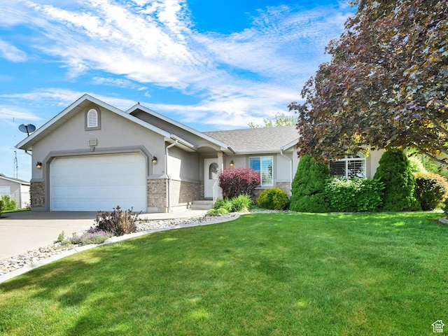 3267 S 1350 W, Perry, UT 84302 - single story home featuring driveway, stucco siding, a front yard, and a garage