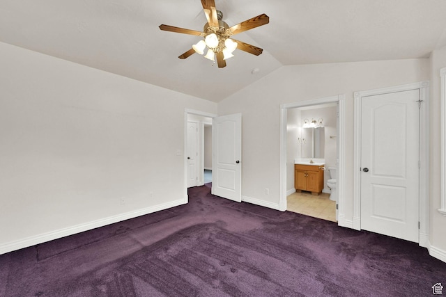 3267 S 1350 W, Perry, UT 84302 - unfurnished bedroom featuring carpet floors, vaulted ceiling, baseboards, ensuite bathroom, and a sink