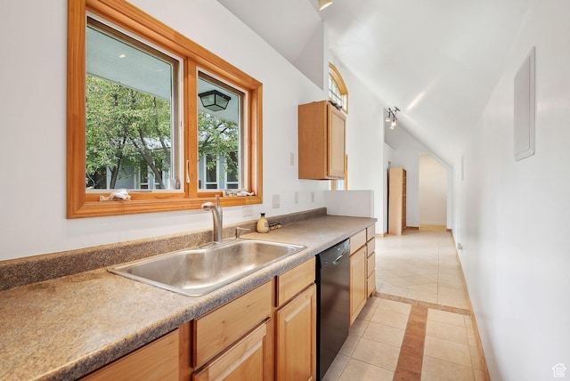2625 E Kentucky Ave, Holladay, UT 84117 - kitchen with black dishwasher, light tile patterned floors, a sink, inlaid floor details, and baseboards
