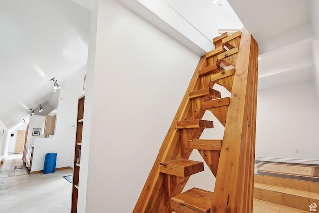 2625 E Kentucky Ave, Holladay, UT 84117 - staircase featuring lofted ceiling, tile patterned flooring, and baseboards