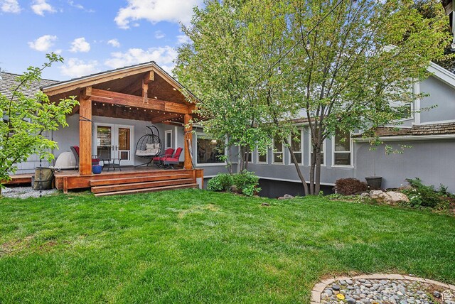 2625 E Kentucky Ave, Holladay, UT 84117 - back of house with a yard, a wooden deck, and stucco siding
