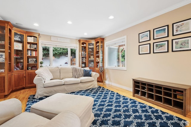 2625 E Kentucky Ave, Holladay, UT 84117 - living room with healthy amount of natural light, crown molding, wood finished floors, recessed lighting, and baseboards