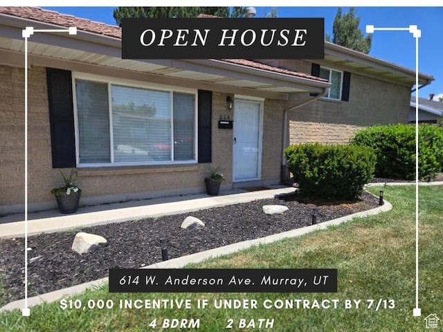 614 W Anderson Ave S, Murray, UT 84123 - doorway to property with brick siding