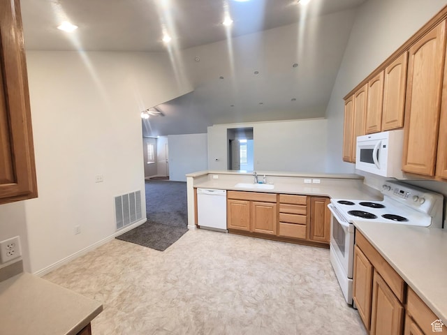 186 S 1900 W Unit R2, Lehi, UT 84043 - kitchen featuring white appliances, a sink, a peninsula, lofted ceiling, and light countertops